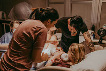 Hampton Roads mom hold baby at hospital